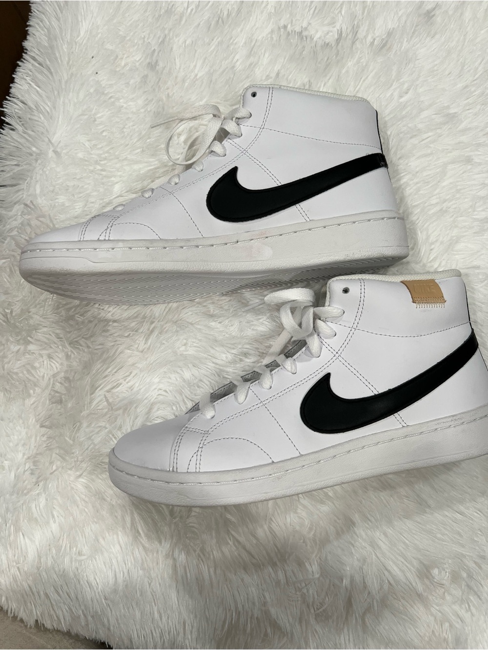 Nike White High-Top Sneakers with Black Swoosh and Tan Heel Tab